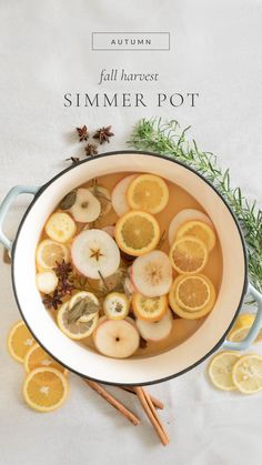 an autumn fall harvest simmer pot with oranges, apples, and cinnamon sticks