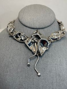 Gorgeous abstract, modernist handmade, one of a kind necklace. Made by Marksz out of Palm Beach. Lovely crinkle design. Marksz and his wife have been making one of a kind jewelry for over 30 years. 46.9 grams. 18 inches neck length. Marked DMW. Acid tested for sterling. Mint condition. Contemporary Sculptural Jewelry For Formal Occasions, Contemporary Silver Jewelry With Artistic Design, Modern Metal Jewelry With Artistic Design, Formal Sculptural Silver Jewelry, Unique Hand Cast Metal Necklaces, Artistic Metal Jewelry With Unique Design, Artisan Silver Necklace With Unique Design, Hand Cast Modernist Jewelry For Gifts, Modernist Hand-cast Jewelry For Gifts