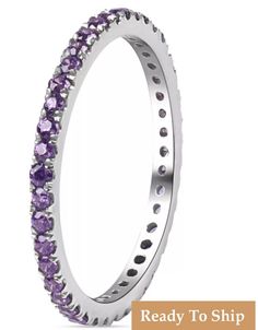 a white gold ring with purple stones on the inside, and an inscription ready to ship