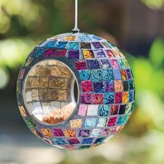 PRICES MAY VARY. Eye-catching Design: This mosaic glass bird feeder features a stunning blend of vibrant colors that will brighten up any garden and attract birds from far and wide. Features a fly-through design that allows wild birds to easily access seed. After they're done eating, they can fly away with ease as well. It's fun to watch them eat and fly back and forth to this bird feeder. Measuring 6 inches high, 6 inches long, and 5 inches wide, this mosaic bird feeder comes with a hanging wir Goddess Garden, Bird Paradise, Glass Bird Feeders, Colorful Mosaic, Wild Bird Feeders, Mosaic Birds, Backyard Porch, Wild Bird Food, How To Attract Birds