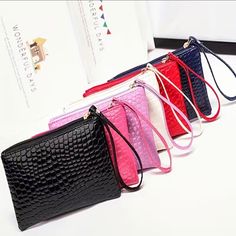 Women's Stylish Wristlet Coin Purse - Zipper Pocket Wallet, Clutch Bag For Cash, Keys & Cell Phone Available In Black & Pink Material: Faux Leather Description: 100% Brand New And High Quality. Pure Color Pu Soft Leather Lychee Pattern Shiny Zipper Coin Purse,Mini And Compact,Carry It With You.Smooth Zipper,Safe And Anti-Theft.It Is Compact And Can Be Installed To Meet Daily Needs. Features: Material: Pu Leather Size: 19cm*1cm*10cm (1 Inch =25.4mm Or 1mm = 0.0393 Inch) Phone Card Holder, Envelope Clutch Purse, Pu Leather Bag, Holder Phone, Handbag Patterns, Crocodile Pattern, Phone Card, Mobile Cases, Money Bag