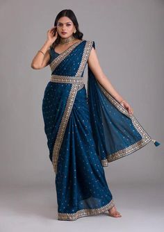 Stylish blue saree blouse for women USA, designer foil printed chinnon silk saree, wedding saree with fancy border work, Indian ethnic saree Saree Details:  Saree Color: Yela Blue  Saree Length: 5.5 Meter Saree Fabric: foil printed chinnon silk  Saree Work : Fancy thread work with sequence work & multi coding work Blouse Details : Blouse Color: Matching. Blouse Length: 0.8meter Blouse Fabric: chinnon silk  Blouse Work: Fancy Thread Work With Sequins Work With Coding Work Blouse wear by model is Navy Blue Saree, Sabyasachi Sarees, Saree With Belt, Designer Sarees Collection, Ethnic Sarees, Party Kleidung, Blue Saree, Sari Blouse, Art Silk Sarees