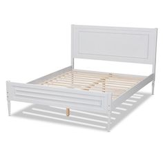 a white bed frame with wooden slats