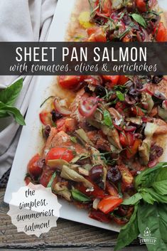 sheet pan salmon with tomatoes, olives and artichokes on a white plate