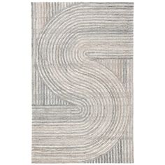 an abstract rug with wavy lines on the bottom, and a spiral design in grey