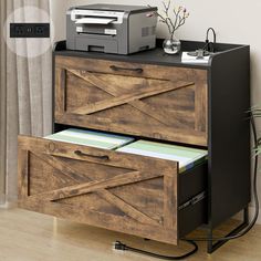 an office desk with two drawers and a printer on top