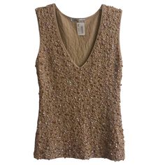 Ambre Babzoe Hand Beaded Tan Sequin Embellished Tank 36. New With Tags. V-Neck, Sleeveless. 16 Inches Armpit To Armpit (I Stretched), 24.5 Inches Shoulder To Hem. Rayon, Elasthane. Made In France. Smoke-Free Home. Not A Posh Member? Enter My Referral Code Dnsesq1 When You Join And Receive A $10 Credit. Glamorous Embellished V-neck Tops, Hand Beading, Made In France, Sequin, Womens Tops, V Neck, Tank Tops, France, Tags