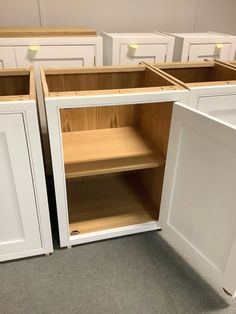 the cabinets are all white and have no doors