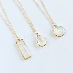 "Mother of pearl pendant necklace available in oval, round and rectangular shape suspended from a 14k gold-filled delicate chain. Available in 16\", 18\" and 20\" Chain: 14kt gold-filled Pendant size(including loop): Rectangle 9 X 27 mm, Circle 14 mm, Tear Drop: 10.6 X 18.5 mm Available in 14kt gold-filled Listing is for one necklace Let's keep in touch, sign up for our newsletter and receive 15% off your first order https://lp.constantcontact.com/su/Dpyaymg" Elegant 14k Gold Filled Rectangular Necklace, Gold Oblong Necklace For Gift, Rectangular Pearl Drop Jewelry For Gifts, Elegant Oblong Necklaces As Gifts, Elegant Oblong Jewelry For Gift, Elegant Oblong Jewelry Gift, Crescent Moon Necklace Silver, Gold Pearl Jewelry, Moon Necklace Silver