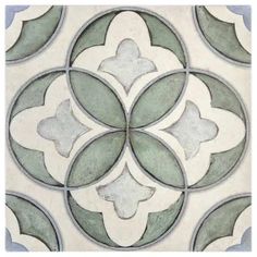 an artistic tile design in green and white