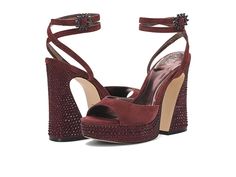 Vince Camuto Inna - Women's Shoes : Crimson : Add a refined and polished touch to your overall attire by slipping into the Vince Camuto Inna sandals. Suede upper. Synthetic lining with cushioned footbed. Open almond toe silhouette. Sky-high block heel. Rhinestone embellishment on the midsole and heel. Ankle-wrap silhouette with adjustable buckle closure on it. Durable synthetic outsole. Imported. Measurements: Heel Height: 4.5, Platform Height: 1.2, Weight: 0.36 oz. Weight of footwear is based o Glamorous Leather Sandals With Stacked Heel, Block Heel Embellished Sandals For Night Out, Embellished Block Heel Sandals For Night Out, Embellished Sandals With Block Heel For Night Out, Luxury Sandals With Stacked Heel For Party, Chic Embellished Wedge Heels, Luxury Party Sandals With Stacked Heel, Chic Embellished Sandals With Block Heel, Elegant Embellished Wedge Heel Sandals