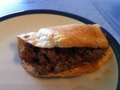 a piece of meat pie on a plate