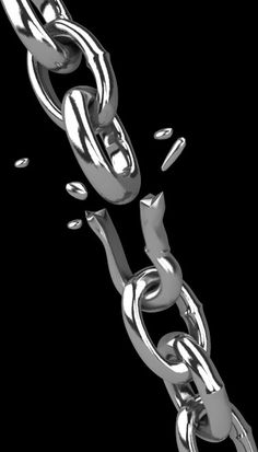 a silver chain with two links attached to it, in the middle of a black background