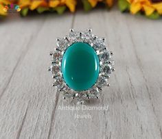 7.67 CT Turquoise Oval Victorian Ring | Bluish Green Natural Turquoise | Moissanite Engagement Ring | Diamond Ring | Wedding Ring | Moissanite Ring | Gold | Engagement Ring | Bridal Ring This is a very beautiful halo vintage ring giving extra-ordinary look when worn with any outfit and occasion. The stones in the ring are cut and polished by our craftsmen and ring is then handmade by our artist.All diamonds or stones used by us are conflict-free.They are pure moissanite and are not treated to en Ring Gold Engagement, Moissanite Vs Diamond, Victorian Ring, Forever One Moissanite, Ringe Gold, Victorian Rings, Ring Moissanite, Bluish Green, Antique Diamond