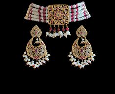 bridal set includes choker , earrings , jhoomar tika made using shell pearls , faux ruby beads and gold plated Ruby Beads, Bridal Set, Bridal Sets, 3 Weeks, Choker, Ruby, Gold Plate, Shells, Plating