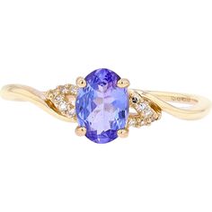 Enchanting 14K Yellow Gold Tanzanite Ring with Diamond Accents - 0.75 Carat Tanzanite, 0.05 Carat Diamonds Elegant Tanzanite Ring, Formal Tanzanite Birthstone Ring, Elegant Gold Tanzanite Diamond Ring, Elegant Tanzanite Birthstone Ring For Promise, Yellow Gold Tanzanite Rings With Accent Stones, Yellow Gold Tanzanite Diamond Ring With Accent Stones, Formal Tanzanite Birthstone Ring In Fine Jewelry Style, Formal Tanzanite Birthstone Ring Fine Jewelry, Formal Oval Tanzanite Birthstone Ring