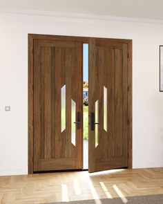 two wooden doors in an empty room