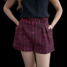 Upgrade Your Summer Wardrobe With Lavender Brown's Laura Shorts In A Playful Pink And Black Tweed Design. These Belted Shorts Effortlessly Combine Style And Comfort, Making Them A Versatile Addition To Your Collection. Perfect For Any Occasion, These Shorts Are A Must-Have For Any Fashion-Forward Wardrobe. Tweed Design, Aqua Shorts, Lavender Brown, Pink Polka Dot Dress, Black Tweed, Brown Shorts, Belted Shorts, Brown Silk, Silk Shorts