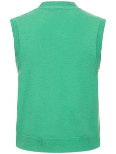 Front button closure. Model is wearing a size8 Sleeveless Cashmere Top For Layering, Casual Sleeveless Cashmere Tops, Classic Sleeveless Vest For Layering, Green Winter Vest For Layering, Winter Workwear Green Vest, Green Winter Workwear Vest, Green Winter Vest Top, Green Winter Layering Vest, Sleeveless Cashmere Sweater Vest For Layering