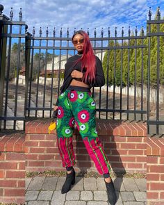 A Smart UNISEX Ankara joggers😍.  🌸 Suitable for all weathers 🌸 FEATURES  ✔️Joggers has a stretch band on the waist with a drawstring. ✔️It has a stretch band on the ankle. ✔️It has a loose fit. ✔️It has 2 Side pockets and 1 back pocket. ✔️Made with high quality African print fabric.  ‼️CUSTOM ORDER!! Production usually takes 2 - 14 days.  Measurement needed:  ✔️Hips circumference  ✔️Pants length.  (If you're having difficulties  providing the measurements, please send us a message. We would be glad to assist you)   💙THANK YOU FOR SHOPPING WITH US💙 Trendy Green Joggers, Trendy Green Joggers With Elastic Waistband, Hip Hop Green Wide Leg Bottoms, Baggy Pink Hip Hop Pants, Pink Baggy Hip Hop Pants, Green Urban Style Bottoms For Spring, Green Baggy Hip Hop Bottoms, Green Joggers With Elastic Waistband, Casual Multicolor Full-length Harem Pants