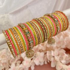 2 Large stacks of luxurious antique Gold bangles with jhumka details and bright multicolour summery bangles. Ready to Ship! Mehndi Bangles, Antique Gold Bangles, Bangle Stack, The Bangles, Summer Soiree, Stacked Bangles, Traditional Jewelry, Gold Bangles, Antique Gold