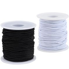 two spools of black and white cord