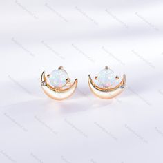 White Fire Opal Stud Earring Black German Fire Opal Post Rainbow Opal Earring 4.5mm Small Petite Stud Gift For Her Vintage Glass Opal Radiant Jewelry takes pride in offering handcrafted engagement rings that undergo rigorous quadruple-checks to ensure the highest quality. PRODUCT INFORMATION >Metal: SOLID 10K / 14K / 18K GOLD /S925 (can be made in white/rose/yellow gold) >Main Stone *Center Stone: White Fire Opal *Size & Shape: 4.5mm Round Cut >Side Stones: *Center Stone: Cubic Zircon / Diamond Black Opal Jewelry, Opal Earring, Stud Earrings Women, Moon Stud Earrings, Handcrafted Engagement Ring, Rainbow Opal, Earrings Rose Gold, Moon Studs, Opal Earrings Stud