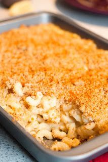 a casserole dish with macaroni and cheese in it on a table