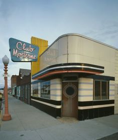 a building with a sign that says club medevine