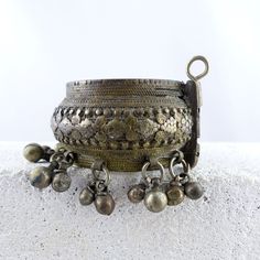 💍We are currently on our HONEYMOON! All orders will be shipped FROM JULY 1st. Thanks for your patience!🤗 Lovely vintage handcrafted oriental BRACELET from Yemen! Excellent age and patina, characteristic traces of wear (see photos). Until 1948 the finest silver jewelry in Yemen was crafted by Jewish silversmiths, largely for Muslim clients. Yemeni bride wealth, mainly silver jewelry, is the wife's property, ensuring her economic security. Since Bedouins are generally poorer than farmers, Bedouin jewelry is generally made of lower grade silver than the jewelry of settled people. AUTHENTIC old HANDCRAFTED tribal jewelry art! Excellent age and patina, characteristic traces of wear. Perfect gift for a very special person! * * * * * * * * * * * * * * Material: metal alloy or low grade silver A Bohemian Tilla Bangle For Ceremonial Occasions, Bohemian Tilla Bangle For Festivals, Bohemian Tilla Bangle Bracelet, Bohemian Brass Bangle For Festivals, Bohemian Tilla Bracelets For Festival, Heavy Bohemian Bangle For Rituals, Heavy Bohemian Bracelets For Festivals, Bohemian Handmade Bangle For Ceremonial Use, Traditional Adjustable Bronze Bangle