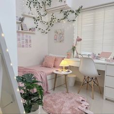 a bedroom with white walls and pink decor