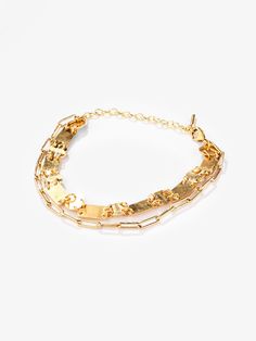 With a sleek brushed matte finish, this bracelet is a great mix of trend and charm. Its geometric shapes, ranging from circles to rectangles, borrowed from the art-deco era - still add a modern touch to your everyday look. The double-layered bracelet features our best-selling Mini Ellipse Chain. The matte texture and 24k gold plated finish make this an easy pick for work or play. Dimension: 6.10in (155mm) chain with 1.9in (50mm) extension chain and lobster clasp Modern Matte Gold Bangle Bracelet, Chic Metal Bracelet With Rectangular Links, Chic Metal Bracelets With Rectangular Links, Metal Jewelry With Double Band Bracelet Strap, Modern Double Band Bracelet Strap Jewelry, Metal Double Band Bracelet Jewelry, Luxury Metal Bracelets With Rectangular Links, Modern Double Band Bracelet With Strap, Elegant Double Band Metal Bracelets