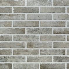 an image of a brick wall that looks like it is made out of cement bricks