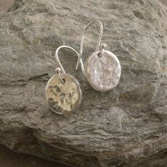 Tin Disc Earrings Simple yet stylish, these lovely tin disc earrings have been skilfully designed & handcrafted in Cornwall.  The tin disc is 1.2mm circumference and the drop (including ear wire) is 2.5cm. Complete with sterling silver ear wires and presented in a quality gift box.   A lovely gift for any occasion, especially your 10th anniversary as this occasion is traditionally celebrated with tin! Tin Anniversary Gifts, Tenth Anniversary, Wire Wrapped Jewelry Diy, Crow's Nest, 10th Wedding Anniversary, Contemporary Earrings, 10 Year Anniversary, Anniversary Jewelry, Disc Earrings