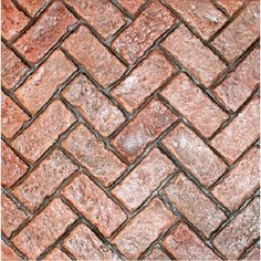 an image of a brick floor that looks like it is made out of red bricks