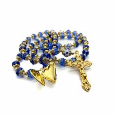 Gold Blue Crystal Rosary Handmade Gold Plated Catholic Rosary Necklace Total Length Of 20". Beautiful 9mm Crystallized Beads With Round Blue Flower Beads Made Of Ceramic. Golden 1.6" Cross Made Of Zinc And Coated With Gold, Preventing Corrosion, Assure Durability For Years. Cross (H X W) : 4 cm / 1.6", Rosary length 21", packed in purple gift velvet Bag. Spiritual natural beads are used as prayer meditation rosary or a religious necklace, a wonderful gift for any occasion, birthday, Confirmation Blue Beaded Rosary As A Gift, Handmade Blue Rosary For Jewelry Making, Adjustable Blue Czech Glass Jewelry, Handmade Royal Blue Round Beads Jewelry, Blue Adjustable Spiritual Jewelry, Adjustable Spiritual Blue Jewelry, Adjustable Blue Beaded Rosary, Blue 8mm Beads Jewelry For Gift, Blue 8mm Bead Jewelry For Gift