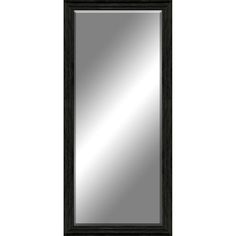 a black framed mirror on a white wall