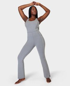 Our statement all-in-one for yoga, Pilates and barre. Exclusive fabric is supportive, breathable, sweat-wicking and 90% squat-proof. Slim fit with scoop neckline. Flattering full-length seamlines with slits at the ankle. Two side slip pockets. Inseam length: 80.5cm / 32”. Model wears size M and is 178cm/5'10" tall. Style Code: SB9661BColour: Medium Grey Marl Functional Fitted Jumpsuits For Yoga, Fitted Yoga Jumpsuits And Rompers, Stretch Athleisure Jumpsuits And Rompers For Pilates, Compression Athleisure Jumpsuits And Rompers For Loungewear, Compression Jumpsuits And Rompers For Loungewear, Functional Fitted Jumpsuits And Rompers For Pilates, Athleisure Compression Jumpsuits For Loungewear, Athleisure Unitard With Thumbholes For Loungewear, Workout Jumpsuits And Rompers With Thumbholes