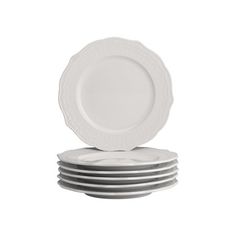 six white plates stacked on top of each other