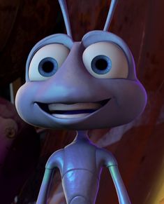 a close up of a cartoon character with big eyes and an insect like body,