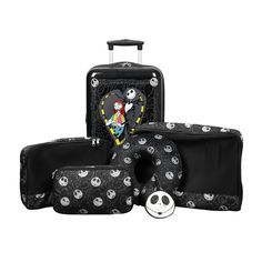 three pieces of luggage with skulls on them and a skull in the middle, one is black