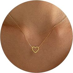 💛 Unleash your inner romantic with our Heart Necklace Design, featuring a delicate and intricate tiny heart on a beautiful chain necklace. This minimal and simple design is perfect for adding a touch of elegance and charm to your everyday look. 💛 Our Heart Necklace comes in a convenient 17" long chain with a 2" EXTENDER adjustable feature, ensuring the perfect fit for any neck size. And to make it even more special, we've upgraded our packaging with durable pouches - the perfect place to store Heart Pendant Necklace Gold, Magnetic Necklace, Trending Jewelry, Four Leaf Clover Necklace, Pendant Choker, Heart Pendant Gold, Dainty Gold Necklace, Heart Chain, Gold Heart Necklace