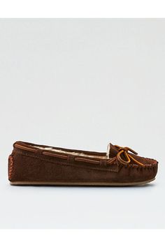 Suede upper with pile lining/Foam EVA midsole/Rubber outsole/Rawhide lacing/Lightweight sole/Not eligible for promotions | Only ships within the USA Moccasin Shoes, Jeans Accessories, Minnetonka Moccasins, Cozy Day, Slide Slippers, Free Jeans, Fuzzy Slippers, Mens Outfitters, Shoes Women