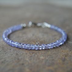 These tanzanite beads are very nicely transparent and a light shade of blue violet. Sterling silver lobster claw clasp Choose 6 1/2 or 7 inches Tanzanite Beads, Tiny Necklace, Silk Necklace, Shade Of Blue, Lobster Claws, Garnet Necklace, Gem Necklace, Dainty Bracelets, Rough Opal