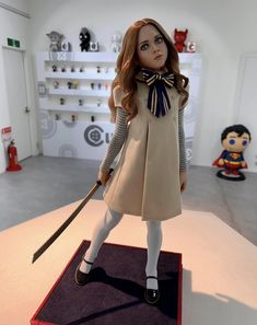 a doll is on display in a room