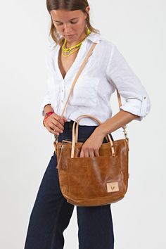 The Meanwhile Small Tote will be your new favorite sidekick whether you're running-errands, doing carpool duty or out on a day date. Everyday Satchel With Handle Drop In Pebbled Leather, Everyday Leather Handles Crossbody Satchel, Crossbody Bag With Leather Handles In Pebbled Leather, Pebbled Leather Satchel With Leather Handles, Crossbody Bag With Pebbled Leather And Leather Handles, Everyday Pebbled Leather Satchel With Detachable Handle, Rectangular Satchel With Pebbled Leather And Leather Handles, Versatile Cognac Satchel With Leather Handles, Pebbled Leather Double Handle Bag For Everyday Use