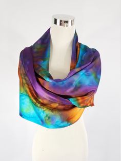 "Hand dyed on luxurious Charmeuse Silk, Multi colored abstract silk scarf 14\"x72\" This is the Porsche of silks! A muted crepe on the back side and shimmery lustrous satin on the top side. It is heavier and more substantial than plain Satin or Crepe De Chine, has a firm, soft, supple hand and a luxuriously heavy drape. Dyes and paints will show an intensity of color and richness on this fiber. This fabric traditionally considered to be the best of the best, unless you get into the velvets...The Bohemian Silk Scarf For Artistic Expression, Artistic Hand Dyed Silk Scarves, Multicolor Hand Dyed Silk Scarves, Hand Dyed Multicolor Silk Scarf, Elegant Hand Dyed Multicolor Silk Scarf, Elegant Hand Dyed Silk Scarf, Hand Dyed Silk Scarf, Hand Dyed Purple Silk Scarves, Bohemian Hand-dyed Silk Scarf