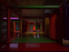 an empty room with red and yellow walls, green flooring and neon lights on the ceiling