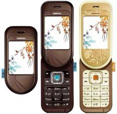 three cell phones with designs on them sitting side by side in different colors and shapes