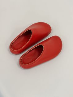 The top of the red clogs for women is made from red genuine leather, adding a touch of elegance to their whimsical aesthetic. Matching the upper, the insole also features a delightful red colour. These red barefoot clogs prioritize comfort with an orthopedic polyurethane sole covered in leather and EVA. The specialized sole provides optimal support, making them ideal for all-day wear. Additionally, the barefoot clogs feature a soft rim that enhances comfort and prevents any discomfort around the Red Flat Slip-ons With Leather Sole, Red Slip-ons With Rubber Sole, Leather Slip-on Clogs With Red Sole, Red Slip-on Mules With Rubber Sole, Red Closed Toe Slip-ons With Leather Sole, Red Slip-on Mules With Leather Footbed, Red Clogs With Leather Footbed And Round Toe, Red Leather Slip-ons With Round Toe, Red Slip-on Slippers With Rubber Sole